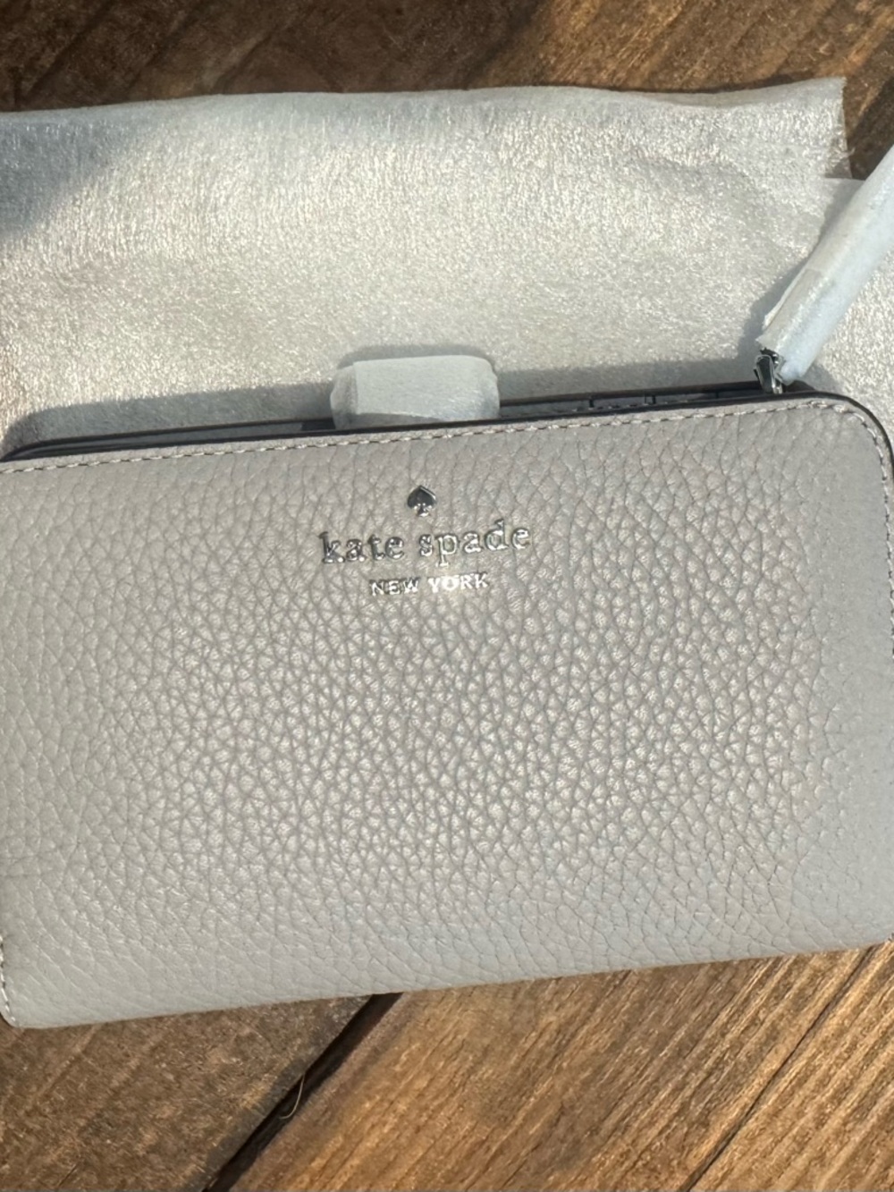 kate spade gray pebbled leather zip wristlet wallet